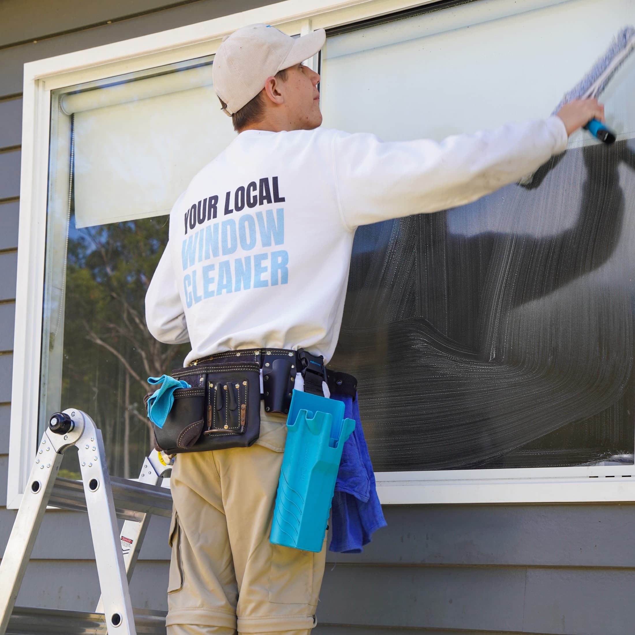 Windows soaped up mid-clean at a Lockyer Valley home